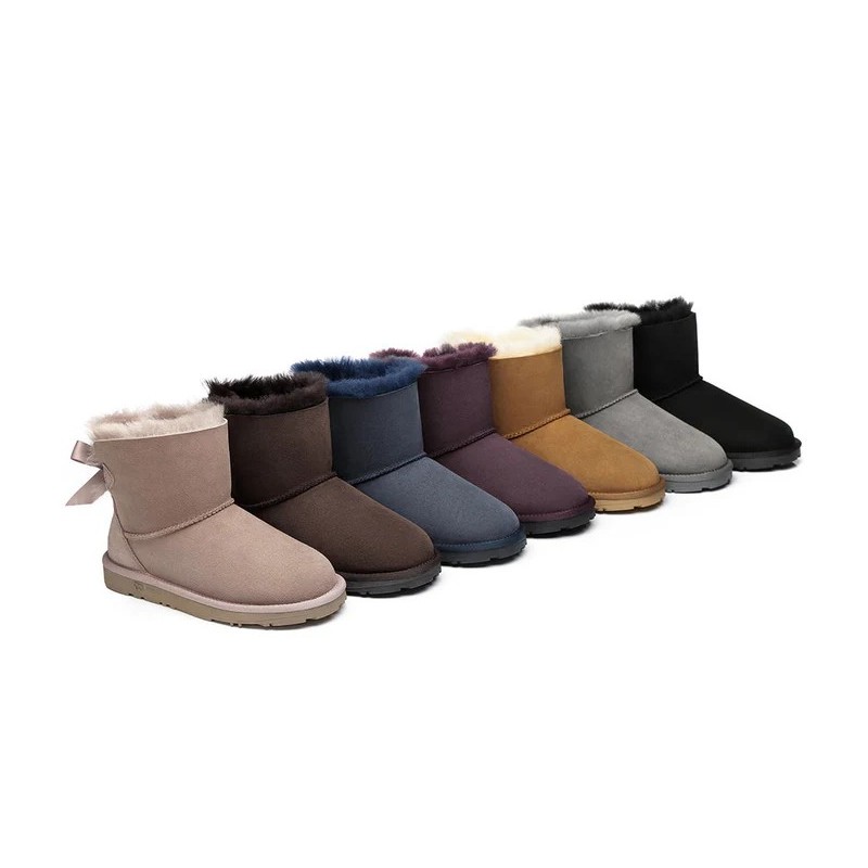 Ugg bottes en peau de mouton Mini arc arrière simple Aube rose