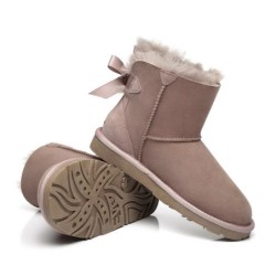 Ugg bottes en peau de mouton Mini arc arrière simple Aube rose
