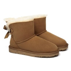 Ugg bottes en peau de mouton Mini arc arrière simple Aube rose