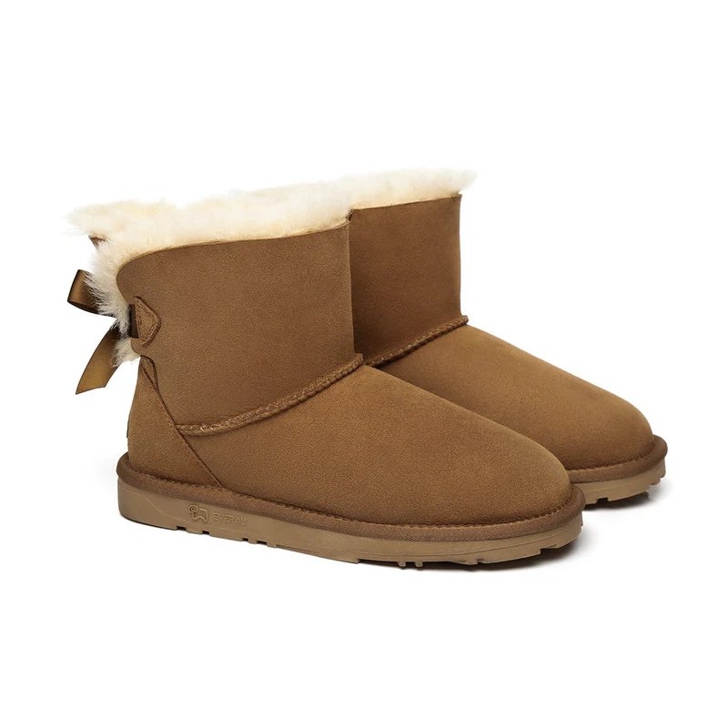 Ugg bottes en peau de mouton Mini arc arrière simple Aube rose