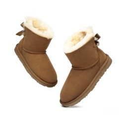 Ugg bottes en peau de mouton Mini arc arrière simple Aube rose